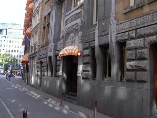 a building on the side of a city street at Rho Hotel in Amsterdam