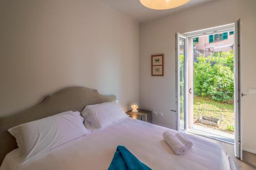 Postel nebo postele na pokoji v ubytování CASA BRIGITTE Comfort, Vista e Parcheggio