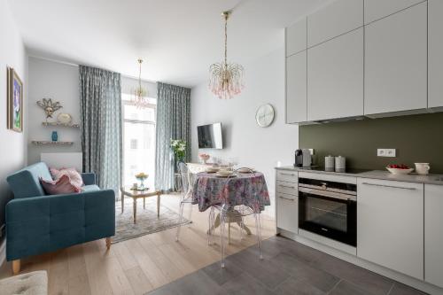 Kuchyň nebo kuchyňský kout v ubytování Apartament Wenecja Błękitna - Młyn Maria - Art Apartments