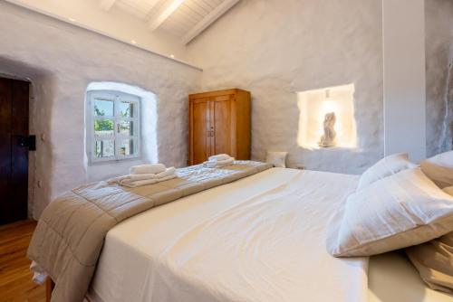Katil atau katil-katil dalam bilik di STARA KUĆA - old stone house