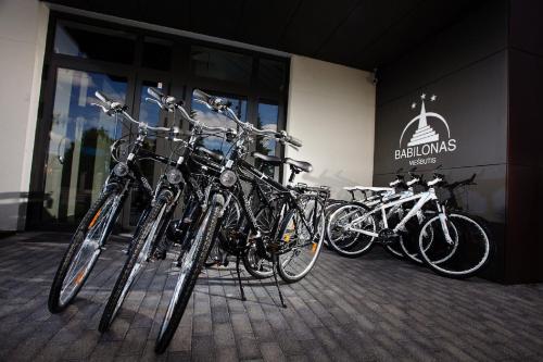 a group of bikes parked in front of a building at Hotel Babilonas in Kaunas