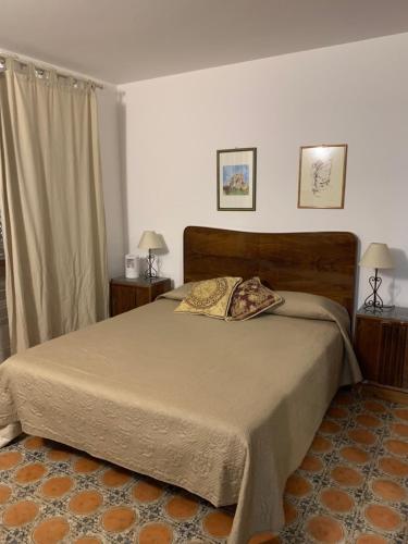 Llit o llits en una habitació de A... Mare Sicilia