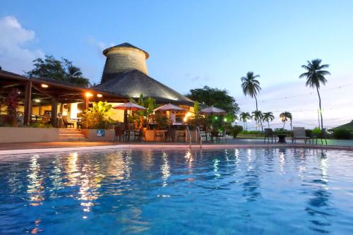 a resort with a pool in front of a building at Mount Irvine Bay Resort in Grafton