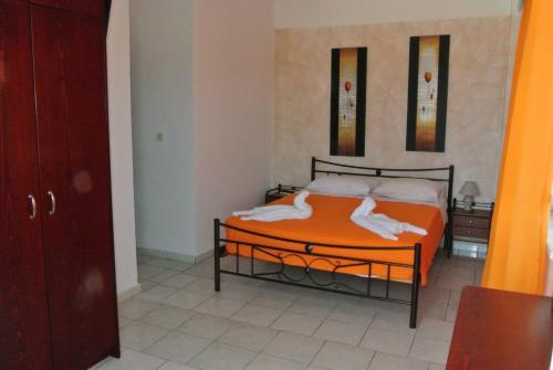 Posteľ alebo postele v izbe v ubytovaní Kokalakis Hotel