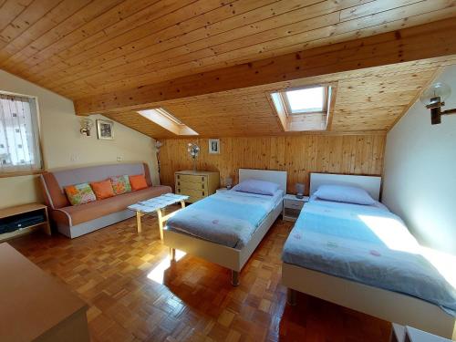 Postel nebo postele na pokoji v ubytování Apartments Faran