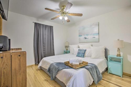 מיטה או מיטות בחדר ב-Home with Deck and Hot Tub - Lake Mitchell Views!