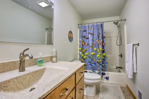 A bathroom at Home with Deck and Hot Tub - Lake Mitchell Views!