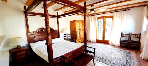 Postel nebo postele na pokoji v ubytování Villa Puerto Blanco