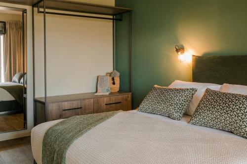 Kappa Suites & Apartmentsにあるベッド