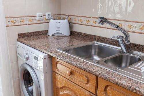 Køkken eller tekøkken på Gama Marina View Apartment