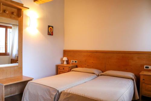 Кровать или кровати в номере Agriturismo La Bella