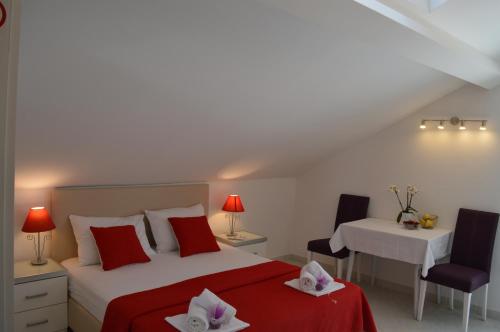 Ένα ή περισσότερα κρεβάτια σε δωμάτιο στο Villa Kristonia