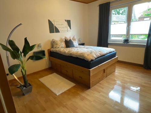 Postel nebo postele na pokoji v ubytování Ferienwohnung am Kirschenbaum