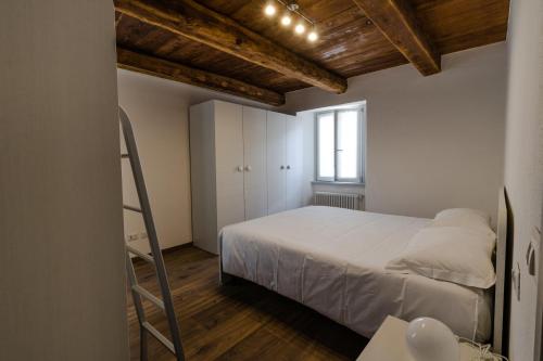 Posteľ alebo postele v izbe v ubytovaní Residence Il Muretto