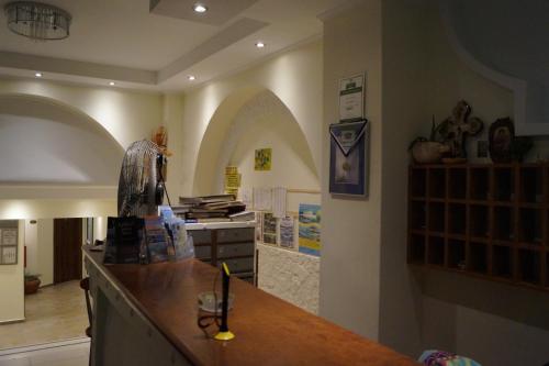 a kitchen with a counter and a counter top at Billy's Studios in Faliraki