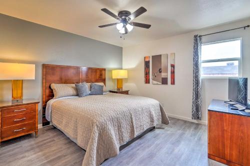 a bedroom with a bed and a ceiling fan at Odessa Apartment Near Parks, Shops and Dining! in Odessa