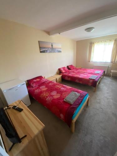Postel nebo postele na pokoji v ubytování VILAR HOSTEL