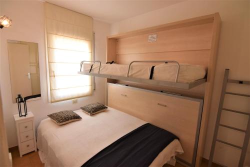 Postel nebo postele na pokoji v ubytování 394-Duplex moderno cerca playa y en pleno centro
