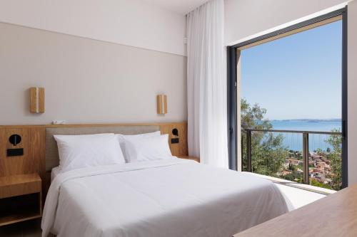 Postel nebo postele na pokoji v ubytování Greenstone Villas
