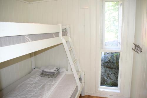 Dviaukštė lova arba lovos apgyvendinimo įstaigoje Hytte i Raftsundet