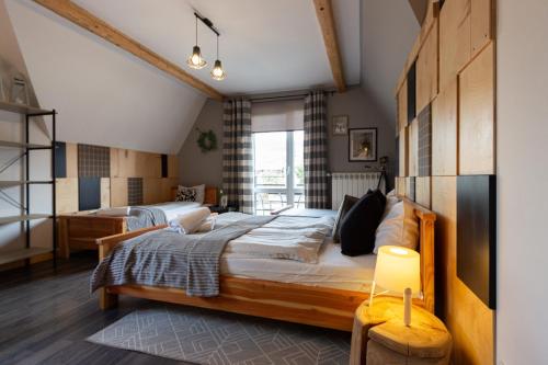 En eller flere senge i et værelse på Dom Numer 127