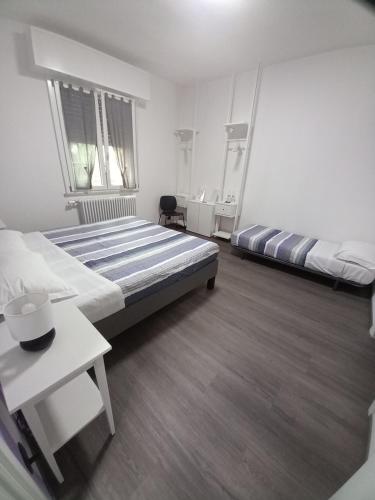 Un pat sau paturi într-o cameră la B&B KM 198 - Room&Breakfast