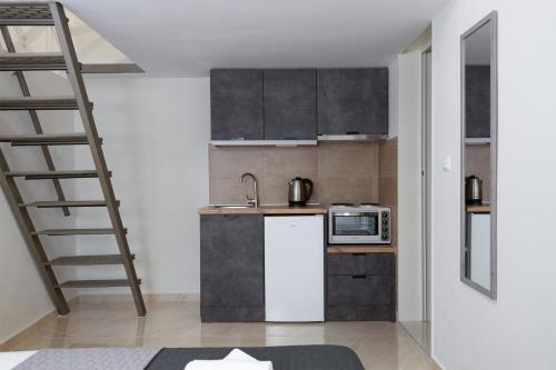 Fotografie z fotogalerie ubytování Sunny Studios 1 v destinaci Mángana