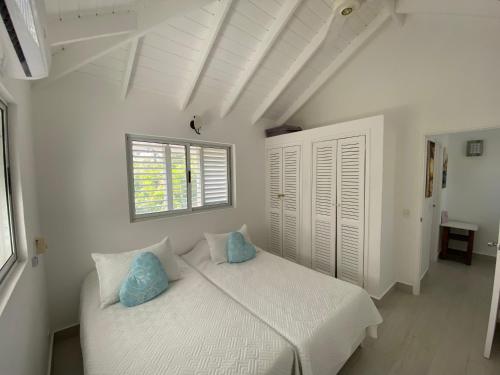 Voodi või voodid majutusasutuse Caribbean Villa Los Lobos Ballenas Beach toas
