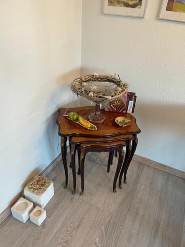 a table with a bowl on it in a room at Sleep In Brande - Close By Herning, Legoland, Givskud Zoo in Brande