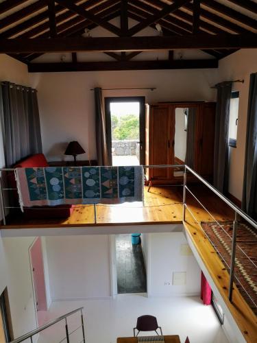 an overhead view of a room with a bunk bed at Retiro dos Bons Sinais in São Roque do Pico