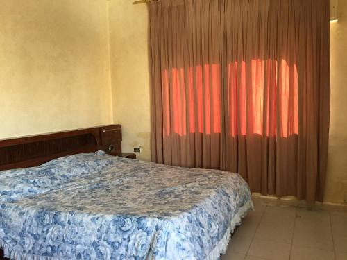 Ένα ή περισσότερα κρεβάτια σε δωμάτιο στο PALM Home