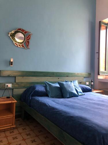 מיטה או מיטות בחדר ב-Hostel Beach House
