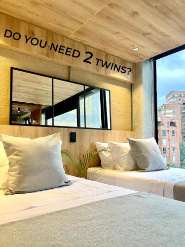 Postel nebo postele na pokoji v ubytování Beminimal Hotel