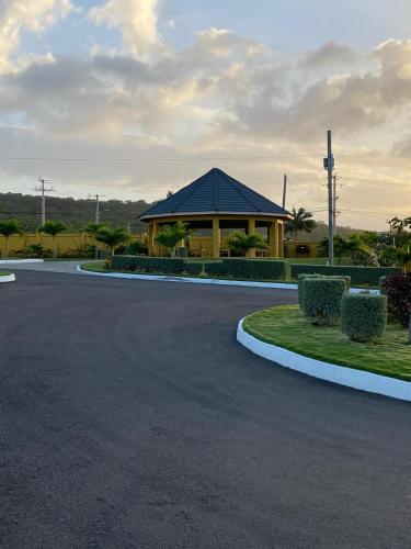 a building with a road in front of it at Seaview Villa at Stonebrook Manor in Falmouth