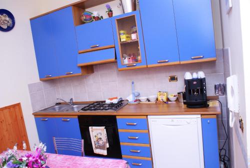 Kuchyň nebo kuchyňský kout v ubytování B&B Al Porto