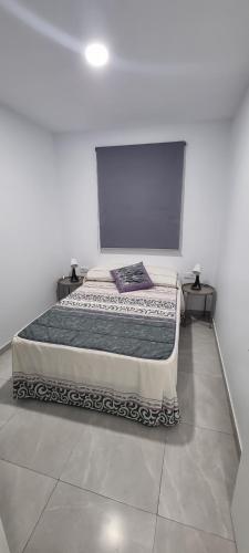 Postel nebo postele na pokoji v ubytování Apartamentos La Playa