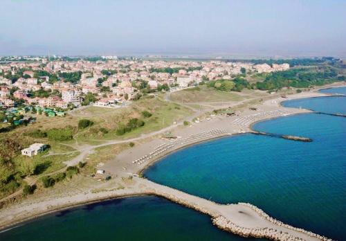 an aerial view of a beach and the ocean at Lovely studio apartment on the beach in Burgas City