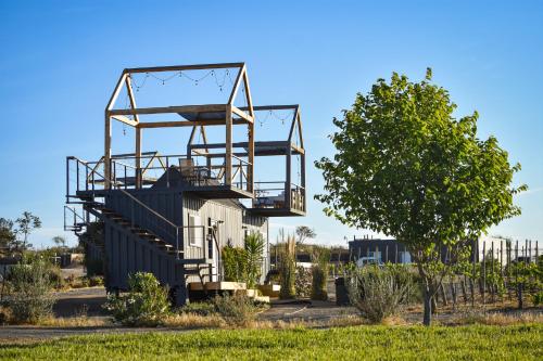 a large crane is on top of a large structure at Lumi in Valle de Guadalupe