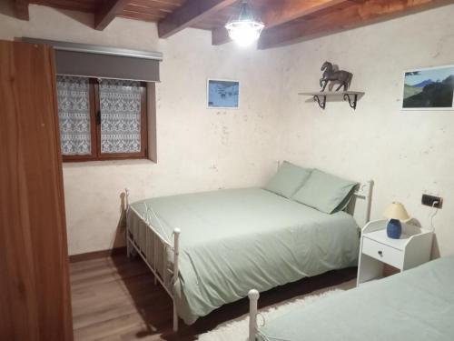 Postel nebo postele na pokoji v ubytování "Apartamento Peña Sagra"