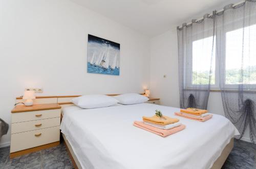 Posteľ alebo postele v izbe v ubytovaní Apartment Andrej