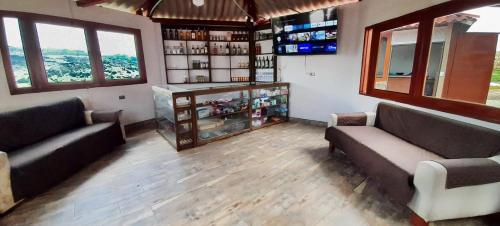 TV a/nebo společenská místnost v ubytování Buenavista Hotel Campestre - Pesca