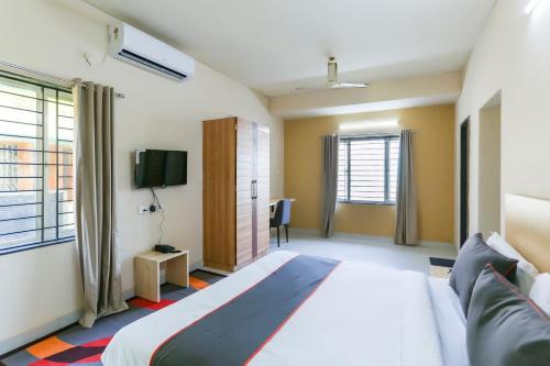 Katil atau katil-katil dalam bilik di Collection O Patra Inn