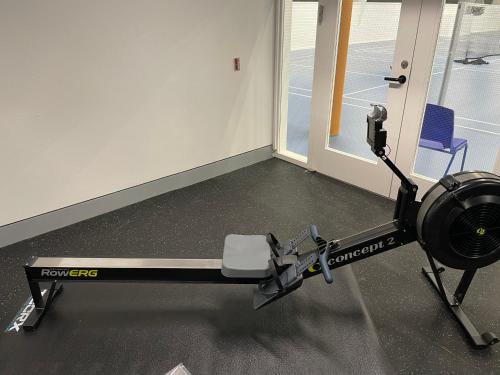 a gym machine with a camera in a room at Perle Øer Maritime ferieby Ebeltoft in Ebeltoft