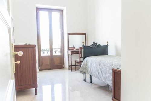 Voodi või voodid majutusasutuse Casa Sampietro toas