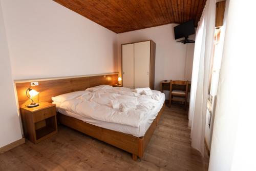 Postel nebo postele na pokoji v ubytování Maso dell Apicoltore