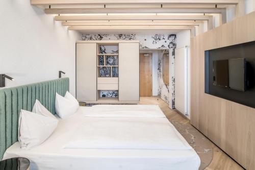 Postel nebo postele na pokoji v ubytování Posthotel Lamm