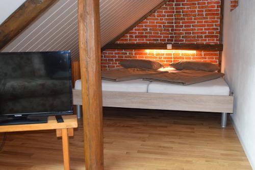 TV a/nebo společenská místnost v ubytování Holstein-Höfle - Gipfelstüble