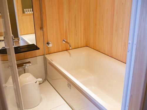 Ванная комната в HOTEL CULTIA DAZAIFU