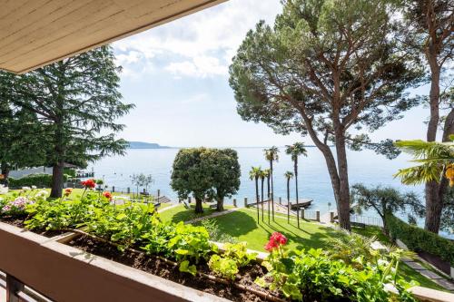 a view of the ocean from the balcony of a resort at Casa Jessika in Gardone Riviera