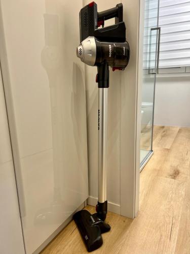 a camera on a tripod in the corner of a room at Ferrarese209 in Bologna